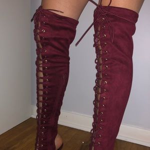 Thigh high strap up heeled boots